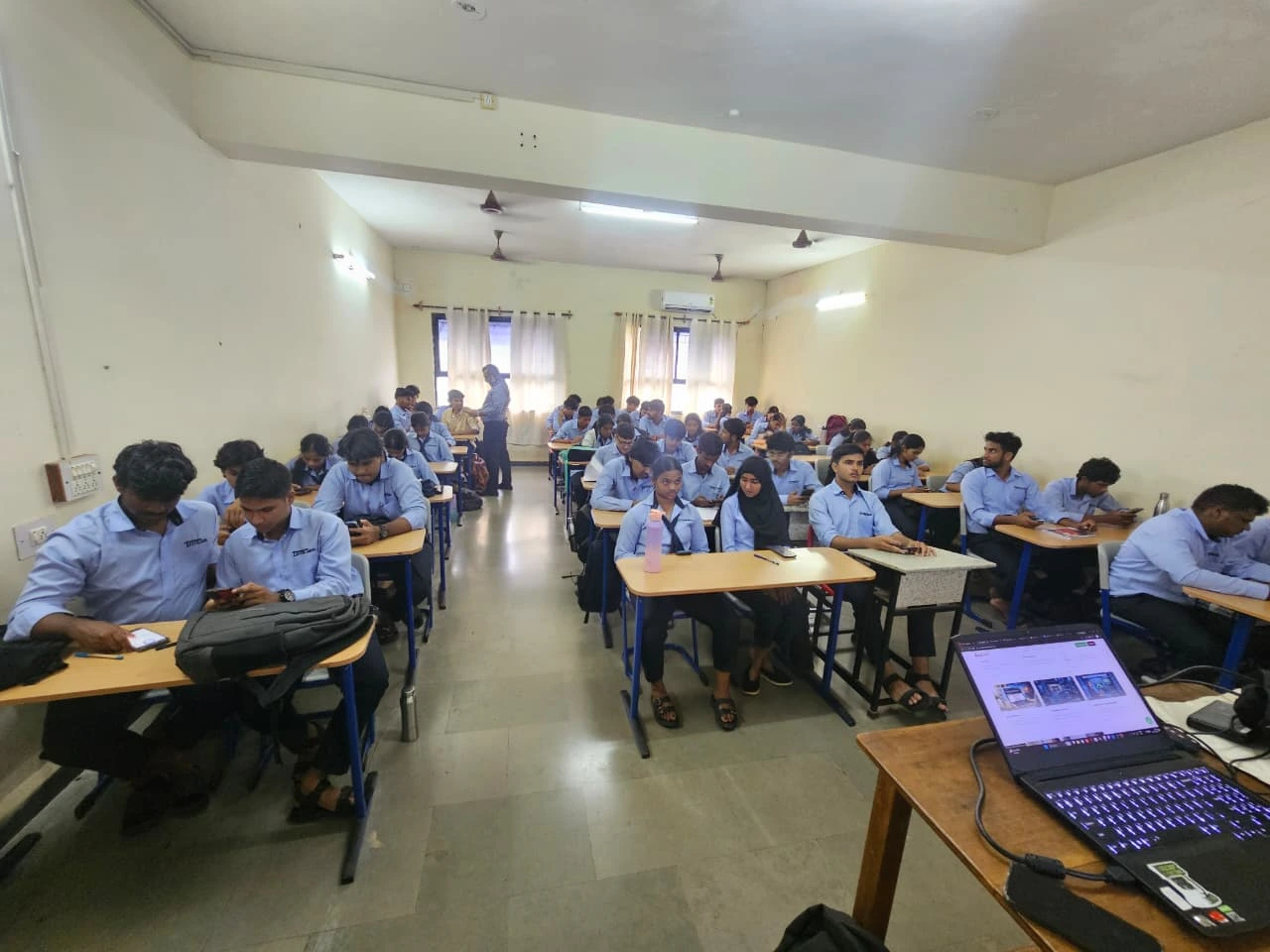 Students engaged in cybersecurity awareness session at Avanteia Cybersecurity with AI Seminar Dnyanprassarak Mandals College and Research Centre DMC Mapusa
